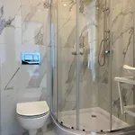 Quarto em Acomodações Particulares Goscinne Akwatel