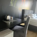 Quarto em Acomodações Particulares Goscinne Akwatel